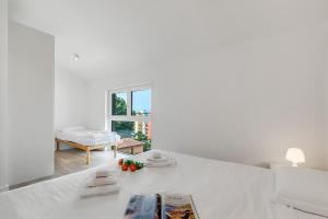 Una cama o camas en una habitación de Viganello Modern Apartments