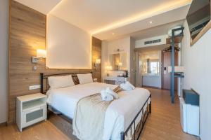Postel nebo postele na pokoji v ubytování Arte Hotel