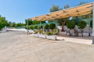 Vonkajšia záhrada v ubytovaní Piccolo Hotel Villa Rosa