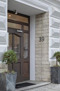 Framhlið eða inngangur FrühstücksHotel Scharinger