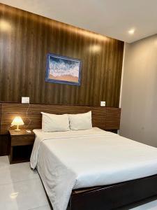 Postel nebo postele na pokoji v ubytování BeSea Hotel