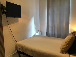 TV a/nebo společenská místnost v ubytování Chambre Cosy 2 + 11 fotografií