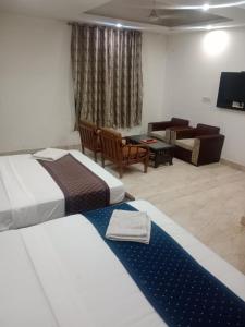 Postel nebo postele na pokoji v ubytování Hotel The Best Delhi International Airport