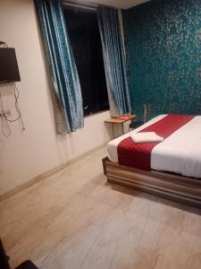 Postel nebo postele na pokoji v ubytování Hotel The Best Delhi International Airport