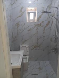Un baño de Cozy Family Villa