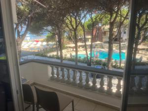a view from the balcony of a resort with a swimming pool at Vila Reni Apartament in Golem