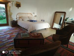 Postel nebo postele na pokoji v ubytování Chambre cosy indépendante chemin du lavoir