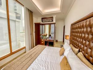 Postel nebo postele na pokoji v ubytování Mirage Bab Al Bahr Hotel