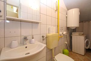 Kúpeľňa v ubytovaní Apartments Sandra 1335 + 18 fotografií