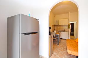 Kuchyňa alebo kuchynka v ubytovaní Apartments Sandra 1335