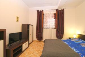 Posteľ alebo postele v izbe v ubytovaní Apartments Sandra 1335
