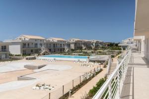 Swimmingpoolen hos eller tæt på GuestHost - Borgo 84 Marzamemi - Interno 23