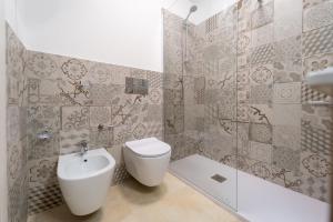 Et badeværelse på GuestHost - Borgo 84 Marzamemi - Interno 23