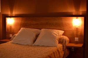Llit o llits en una habitació de Mistral Appartements