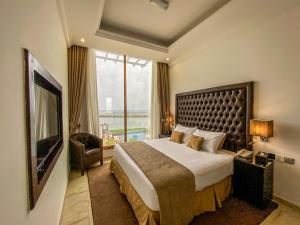 Postel nebo postele na pokoji v ubytování Mirage Bab Al Bahr Hotel