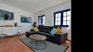 Et opholdsområde på Apartment Bella View Center Playa Blanca By PVL