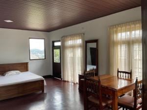 Ένα ή περισσότερα κρεβάτια σε δωμάτιο στο A & P HomeStay