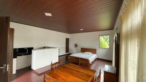 Ένα ή περισσότερα κρεβάτια σε δωμάτιο στο A & P HomeStay