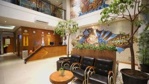 Vstupní hala nebo recepce v ubytování Yellow Star Gejayan Hotel