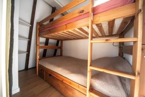 Katil atau katil-katil dalam bilik di Appartement duplex 5 personnes, vue sur la dune #0295
