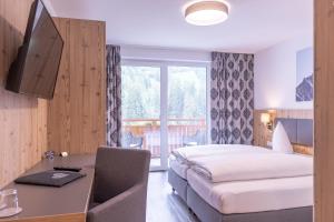 Voodi või voodid majutusasutuse Haus Sattelblick toas +37 fotot