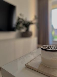 TV a/nebo společenská místnost v ubytování Toliau nuo šurmulio