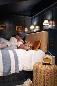 Ein Bett oder Betten in einem Zimmer der Unterkunft The Ragged Robin - A Heartwood Inn