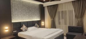 Katil atau katil-katil dalam bilik di Hotel Valley Inn