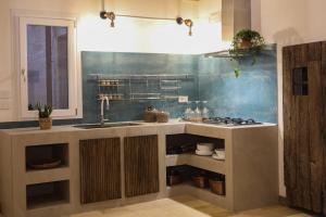 Η κουζίνα ή μικρή κουζίνα στο Gran Pashá HOME +41 φωτογραφίες