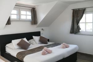 Postel nebo postele na pokoji v ubytování B&B Vidmar, Lesce-Bled