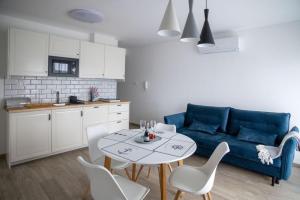 Kuchyň nebo kuchyňský kout v ubytování Patakpart Apartmanok