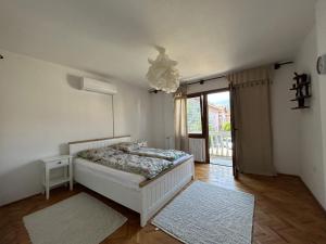 Una cama o camas en una habitación de domus est alba