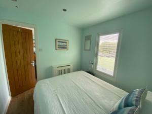 Ένα ή περισσότερα κρεβάτια σε δωμάτιο στο Snowdonia 1-Bed Chalet Sleeps 2 Stunning Views