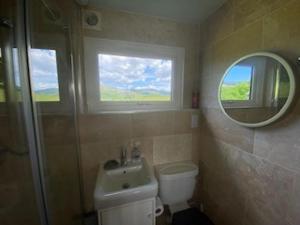 Ένα μπάνιο στο Snowdonia 1-Bed Chalet Sleeps 2 Stunning Views