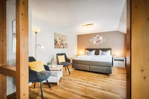 Ένα ή περισσότερα κρεβάτια σε δωμάτιο στο Landhaus Lenneper-Führt +32 φωτογραφίες