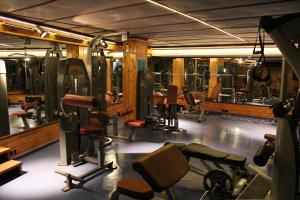 a gym with lots of exercise equipment in it at Bc Spa Hotel in Dalyan