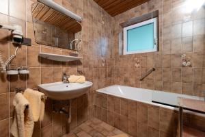 Kúpeľňa v ubytovaní Haus Alpengruß + 37 fotografií