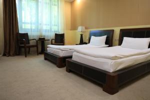 Postel nebo postele na pokoji v ubytování Dilijan Park Resort & Villas