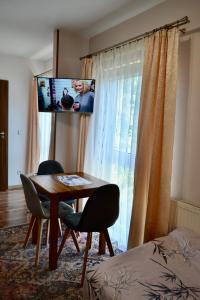 TV a/nebo společenská místnost v ubytování Pokoje Sobie na Wyspie