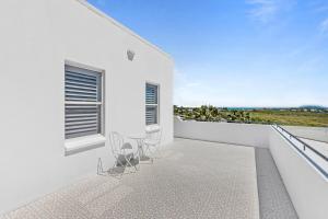 Μπαλκόνι ή βεράντα στο WhitsunStays - The Cyclades