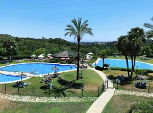 a view of the pool at a resort at Duplex Botánico Resort in Estepona