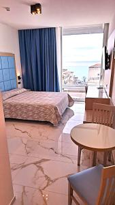 Postel nebo postele na pokoji v ubytování Hotel La Margherita & SPA