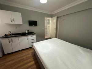 Kuchyň nebo kuchyňský kout v ubytování Kaman Home Apart + 26 fotografií