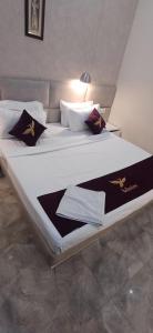 Postel nebo postele na pokoji v ubytování Hotel Prithvi By Admire Stays