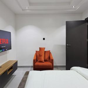 Postel nebo postele na pokoji v ubytování Arusha 202 by SPL