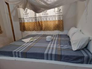 Postel nebo postele na pokoji v ubytování Shalom Homestay