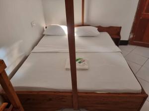 Postel nebo postele na pokoji v ubytování Shalom Homestay