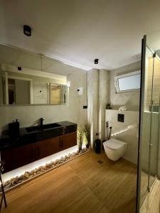 Koupelna v ubytování Olivae Mare Suites