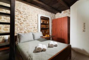 Ένα ή περισσότερα κρεβάτια σε δωμάτιο στο Petra VORI House