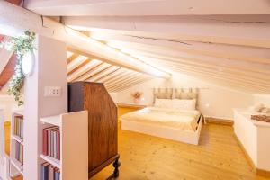 Postel nebo postele na pokoji v ubytování Cottage L'Antico Frantoio + 23 fotografií